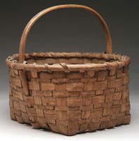 Appraisal: CENTER HANDLED ROUND TOP SQUARE BOTTOMED BASKET SIZE - h