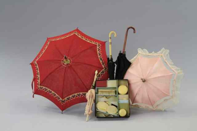 Appraisal: LOT OF FIVE DOLL PARASOLS BOXED ACCESSORIES Largest is pink