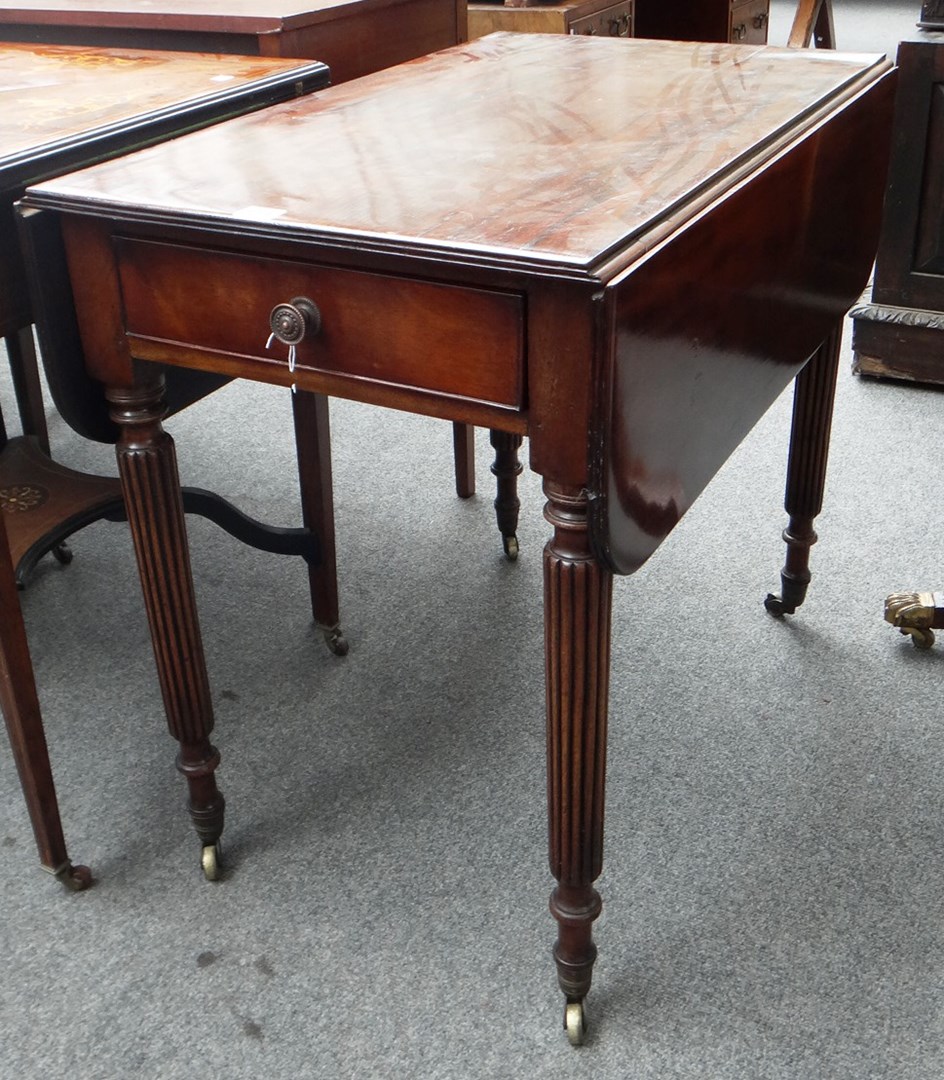 Appraisal: A Regency mahogany Pembroke table with single frieze drawer on