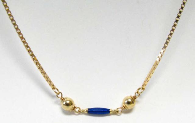 Appraisal: K Yellow gold necklace with enamel beading approximately '' long