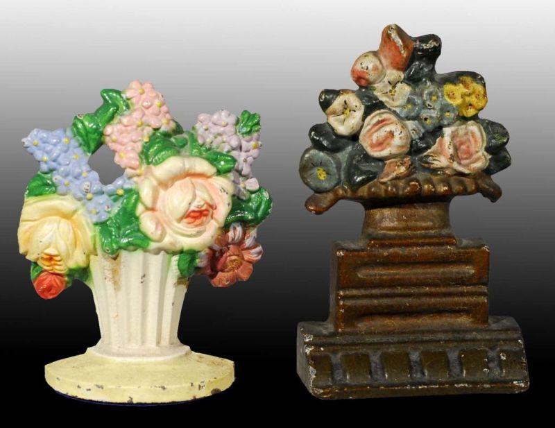 Appraisal: Lot of Cast Iron Flower Doorstops Description Includes roses with