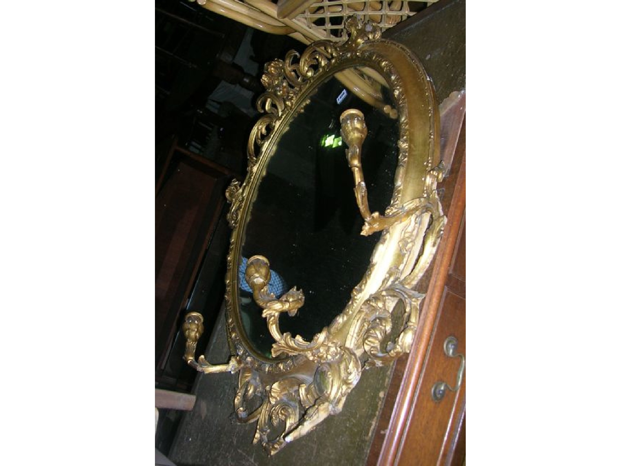 Appraisal: A th century gilt framed girondelle of oval form with