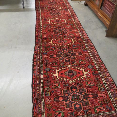 Appraisal: Heriz Persian Handmade Runner fancy geometric medallions stylized floral border