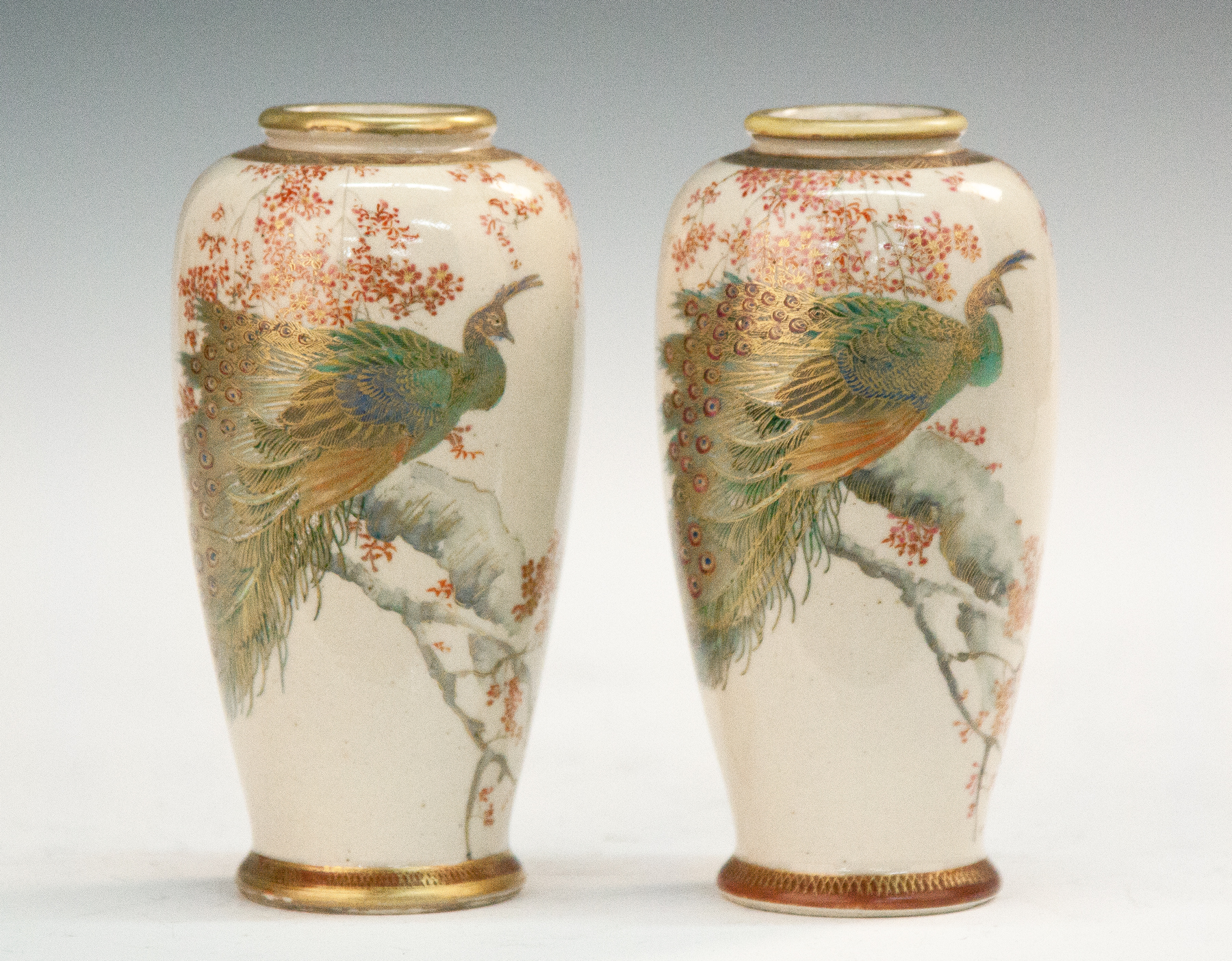 Appraisal: Japanese Satsuma Vases with Peacocks C Sgn Hand painted enameled