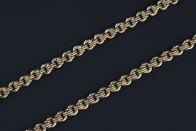 Appraisal: A yellow metal fancy-link chain composed of reeded belcher-links indistinctly