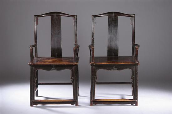 Appraisal: PAIR CHINESE LACQUERED WALNUT YOKE BACK ARM CHAIRS Ming Dynasty