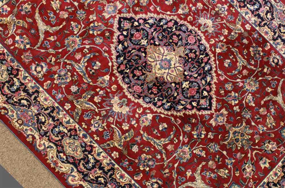 Appraisal: HAND-TIED TABRIZ MEDALLION DESIGN PERSIAN RUG red blue and cream