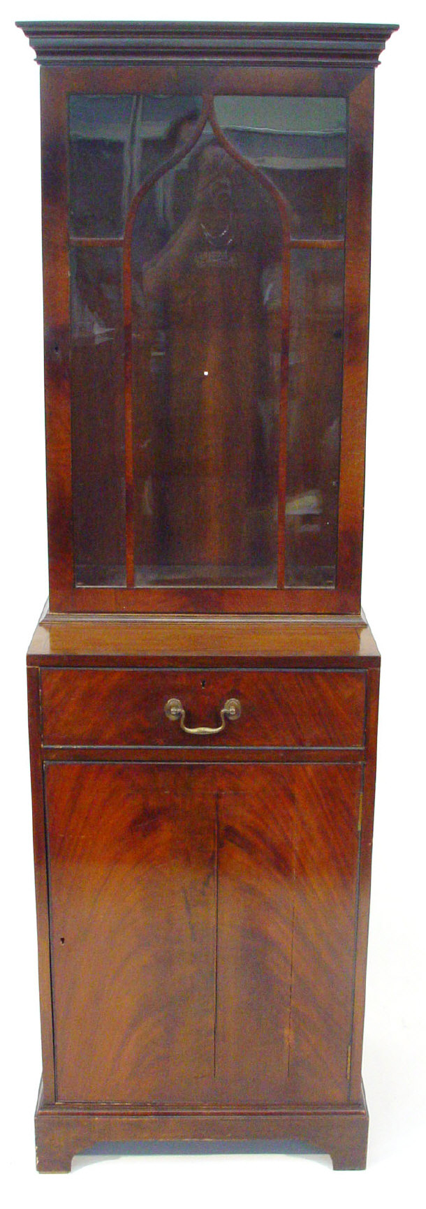 Appraisal: Mahogany pier cabinet the moulded cornice above a glazed door