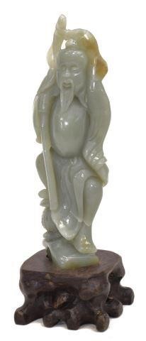 Appraisal: Chinese carved celadon jade figure depicting a fisherman with staff