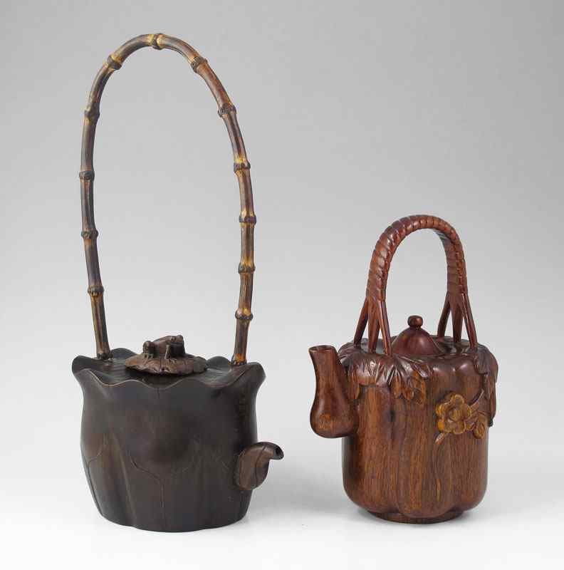 Appraisal: CARVED WOOD CHINESE HOT WATER TEAPOTS To include Lily pad