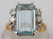 Appraisal: An carat gold marks rubbed aquamarine and diamond ring the