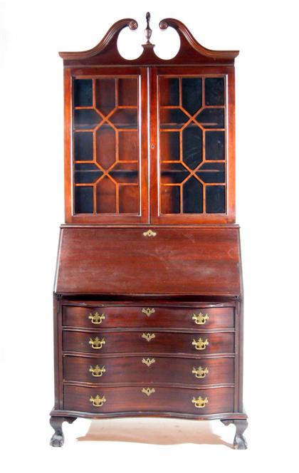 Appraisal: Chippendale-style mahogany secretary In two parts the broken arched pediment