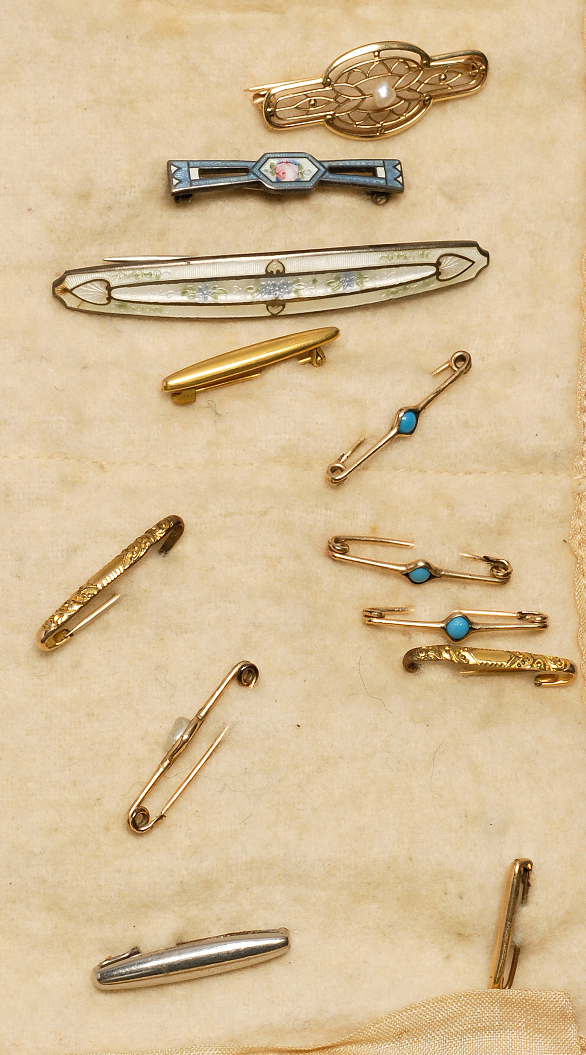 Appraisal: TWELVE SMALL BAR PINS Includes a kt gold filigree pin