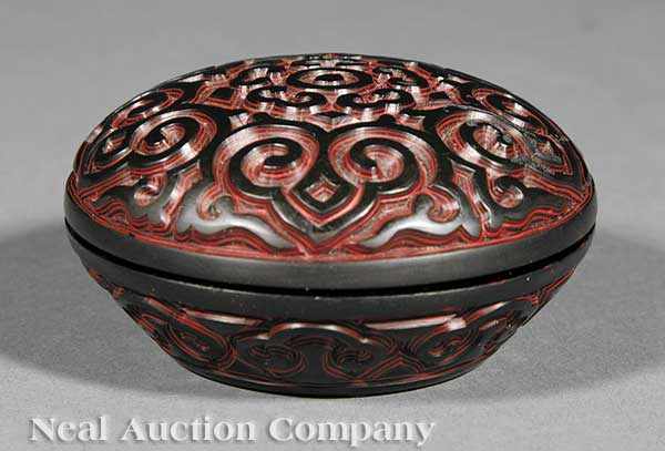 Appraisal: A Chinese Black and Red Guri Lacquer Circular Box and