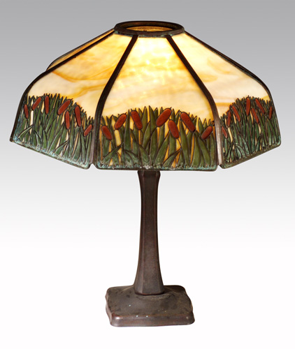 Appraisal: HANDEL Table lamp its large faceted slag-glass shade with brown