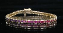 Appraisal: A Rainbow Sapphire Bracelet A Kt yellow gold tennis bracelet