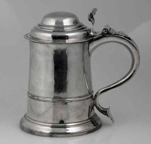 Appraisal: A George II tankard William Williams London the domed hinged