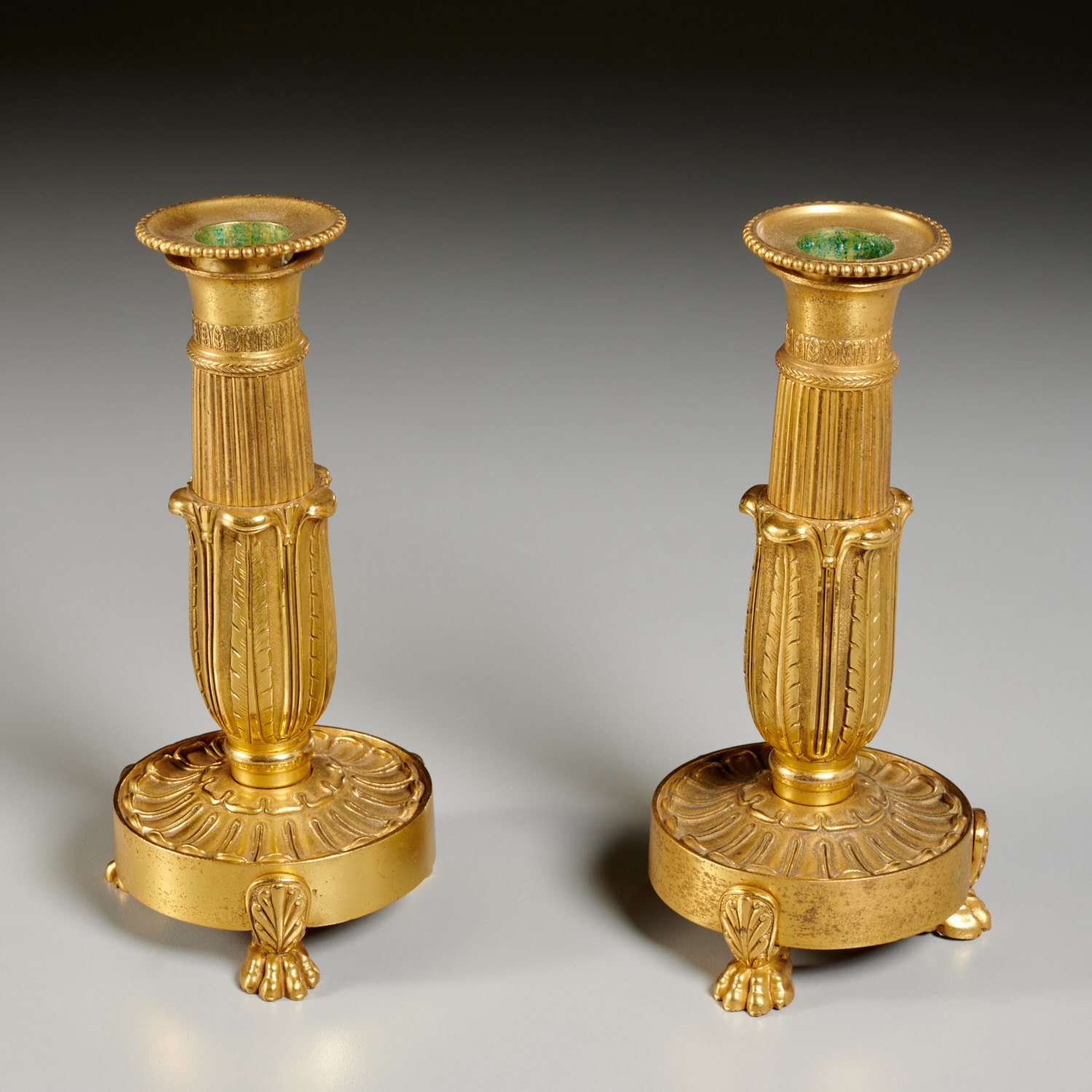 Appraisal: PAIR LOUIS XVI GILT BRONZE CANDLESTICKS th c each of