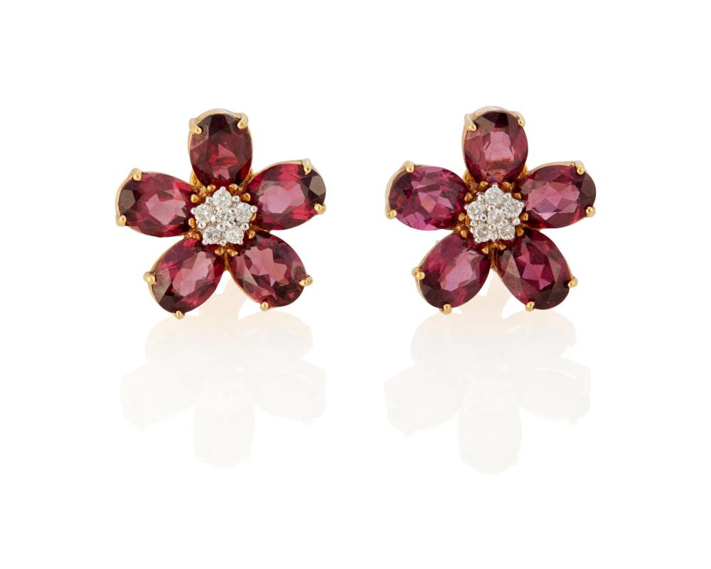 Appraisal: A PAIR OF PURPLE SAPPHIRE AND DIAMOND FLOWER EAR CLIPSA