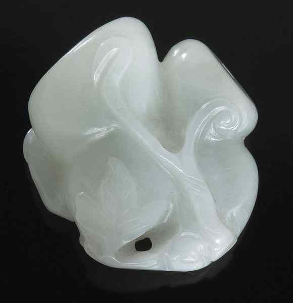 Appraisal: Chinese Qing carved jade toggledepicting a double gourd and a