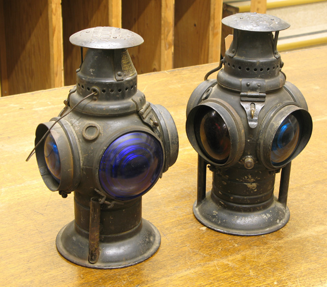 Appraisal: A PAIR OF FOUR-WAY RAILROAD LANTERNS The Adlake Non-Sweating Lamp