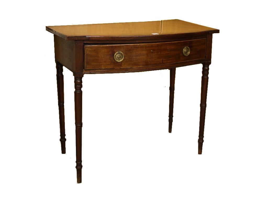 Appraisal: Regency mahogany bowfront side table the single frieze drawer upon