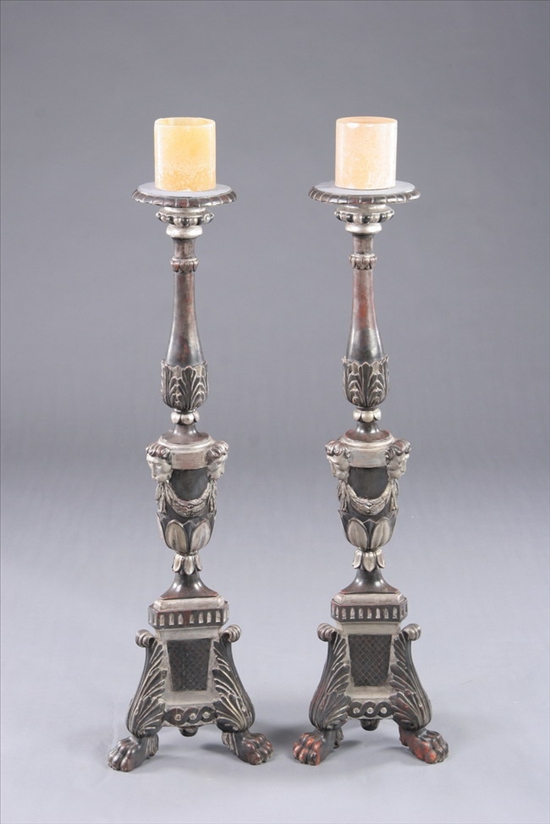 Appraisal: PAIR ITALIAN BAROQUE-STYLE POLYCHROME AND SILVER GILT TORCH RES th