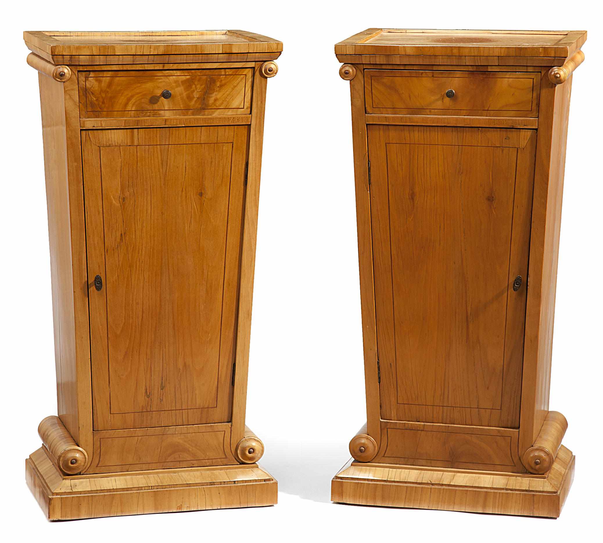 Appraisal: A pair of Biedermeier satin walnut pedestal cupboards early th