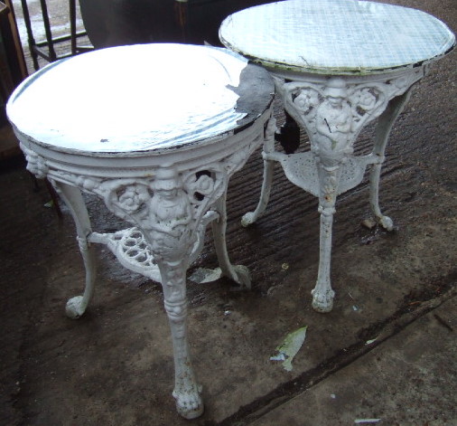 Appraisal: A pair of white painted cast iron 'Britannia' pub tables