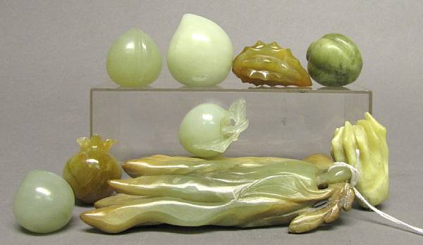 Appraisal: A group of nine carved stone miniature fruit one peach