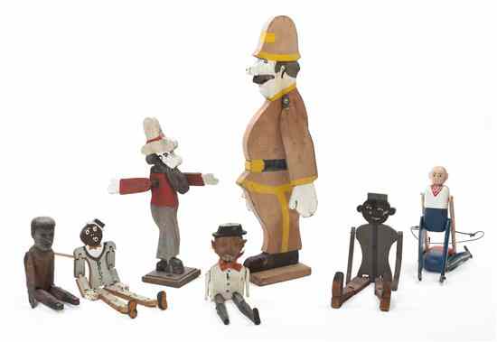 Appraisal: A Collection of Jointed Carved Wood Figures including some black