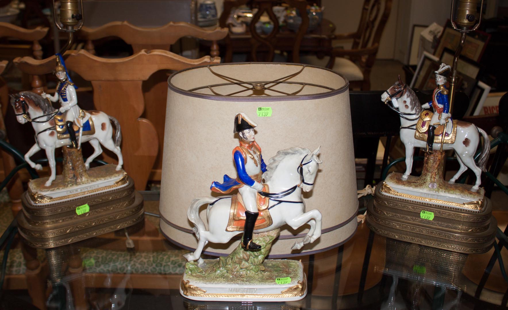 Appraisal: Three French military figurines including two as table lamps with