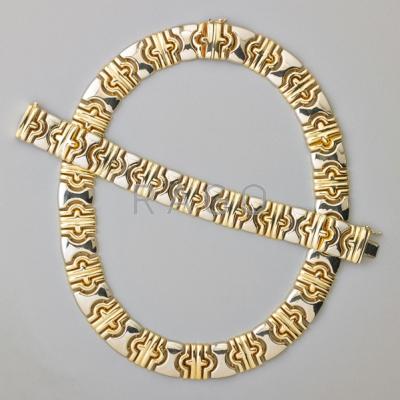 Appraisal: BICOLOR K GOLD LINK NECKLACE AND BRACELET Parenthesis link necklace