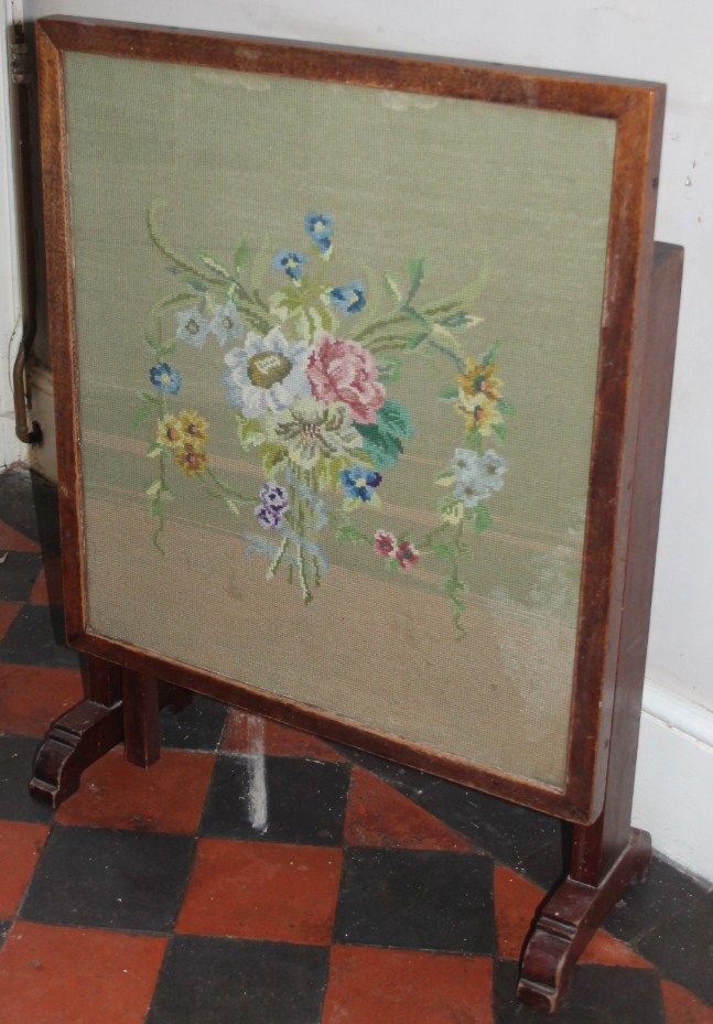 Appraisal: An early thC firescreen occasional table with floral woolwork panel