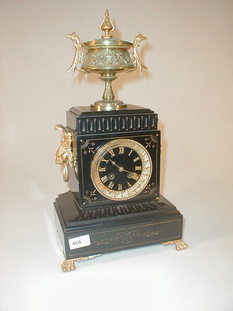 Appraisal: A French polished slate mantel clock with gilt decoration paw