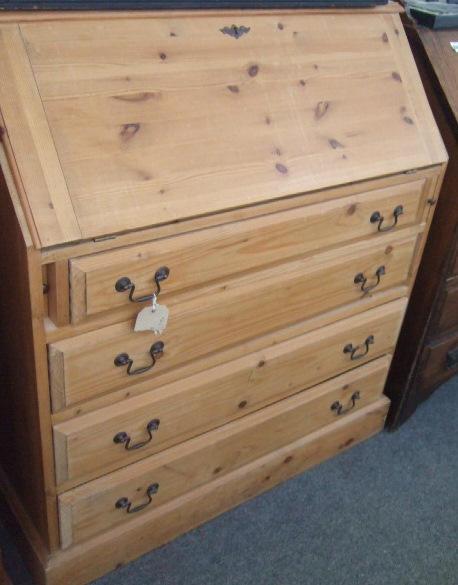 Appraisal: A th century pine bureau the fall enclosing a fitted