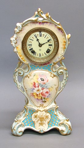 Appraisal: Rococo design case with multicolored floral bouquet white porcelain dial