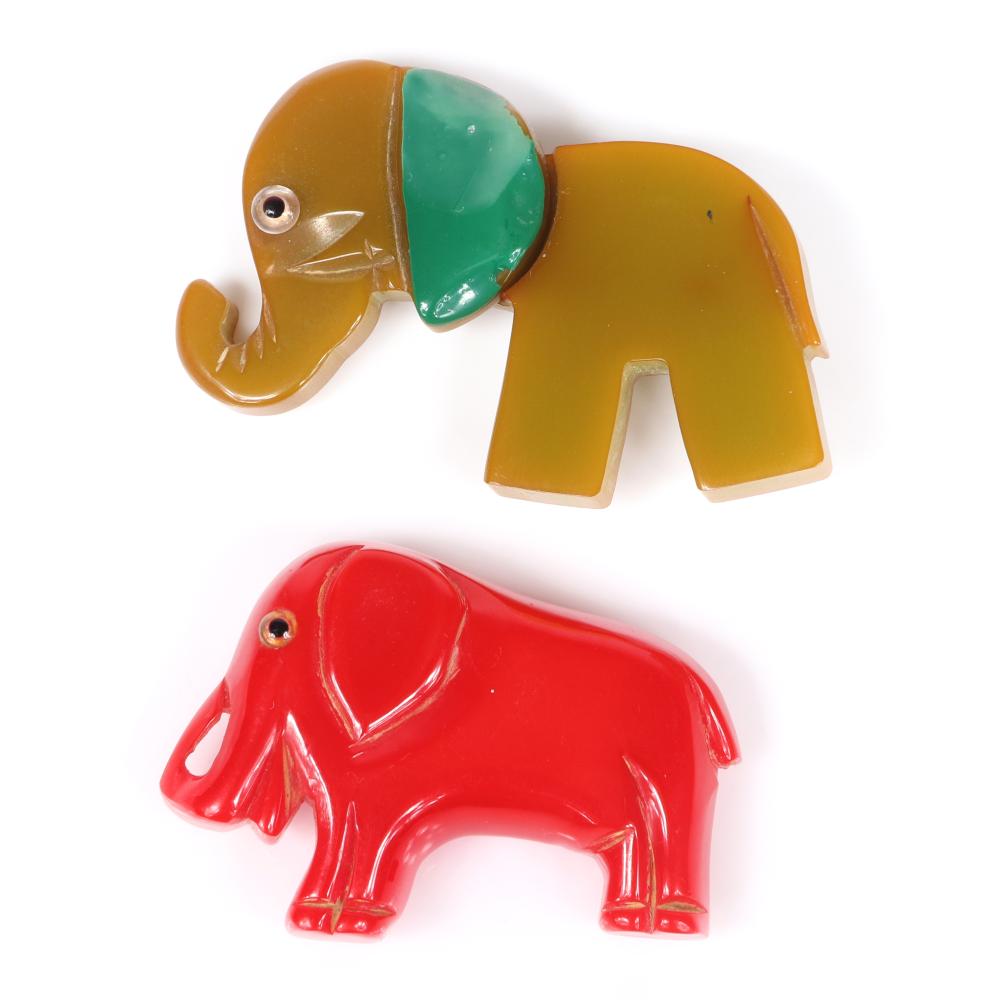 Appraisal: TWO VINTAGE CARVED BAKELITE RED AND GREEN FIGURAL ELEPHANT ANIMAL