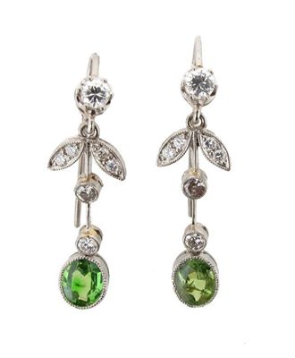 Appraisal: A pair of diamond and green garnet set drop earrings