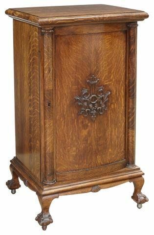 Appraisal: American quarter sawn oak music cabinet c having square top