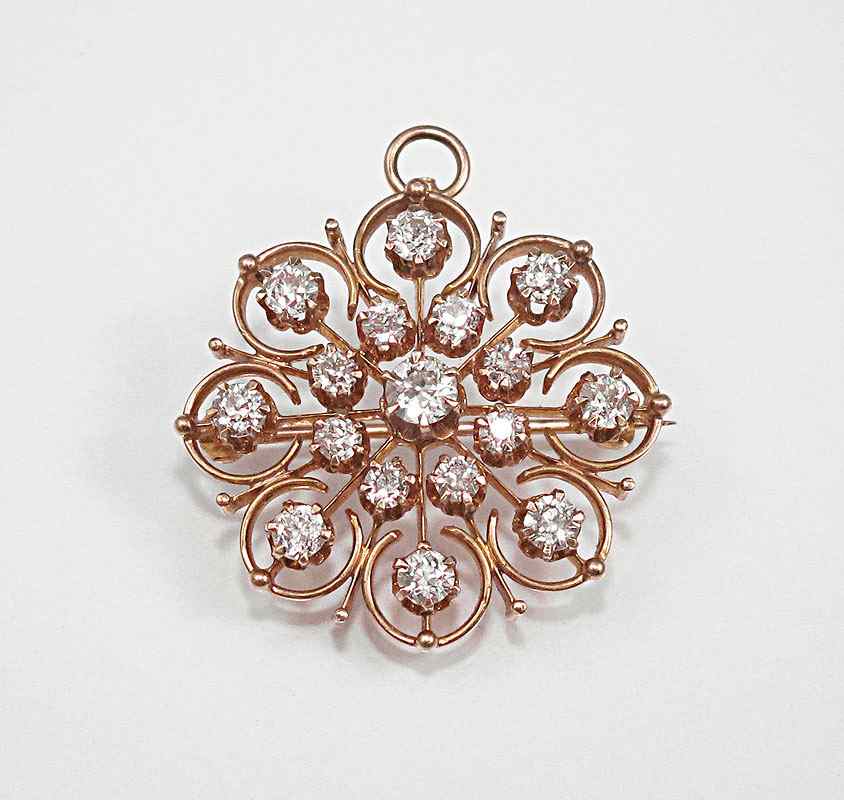 Appraisal: ANTIQUE DIAMOND PENDANT BROOCH Ca 's K yellow gold brooch