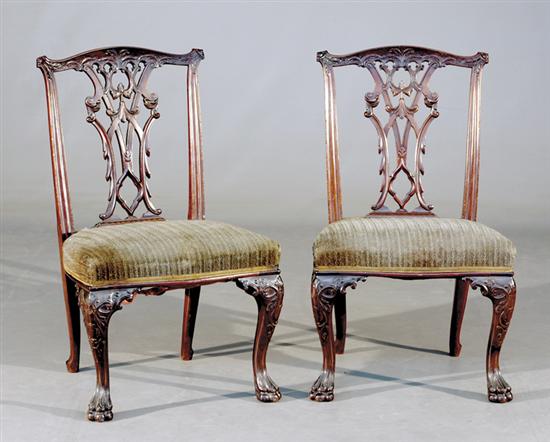 Appraisal: Pair Irish Chippendale style carved mahogany side chairs mid th