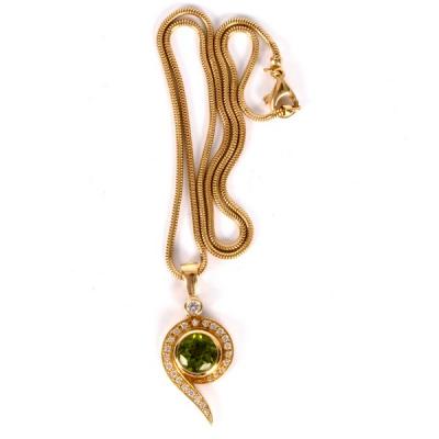 Appraisal: A peridot and diamond pendant by Catherine Best Jersey the