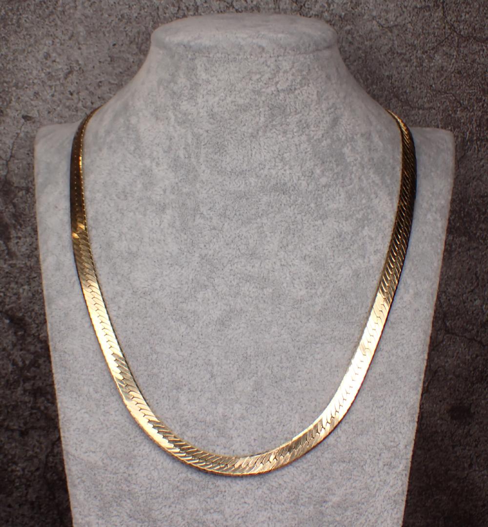 Appraisal: ITALIAN MADE FOURTEEN KARAT GOLD HERRINGBONE CHAIN The - yellow