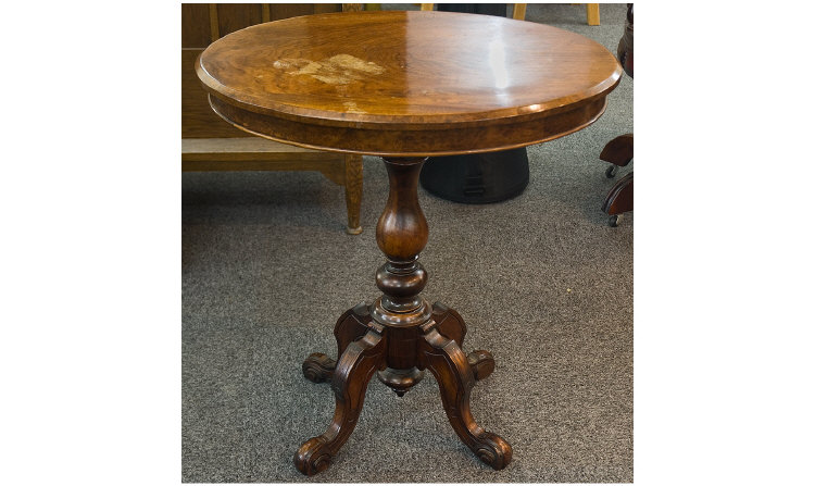 Appraisal: Victorian Walnut Table Oval Top Supported On A Turned Column