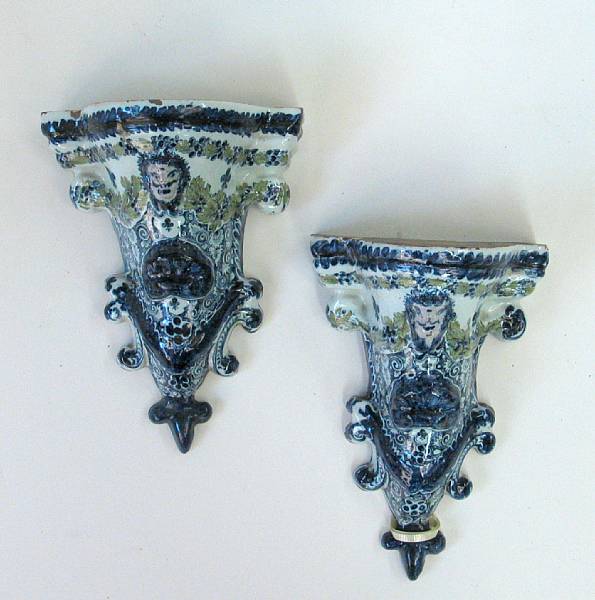 Appraisal: A pair of French Baroque style faience wall brackets possibly