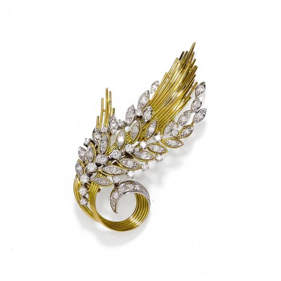 Appraisal: DIAMOND AND GOLD BROOCH ca Yellow and white gold g