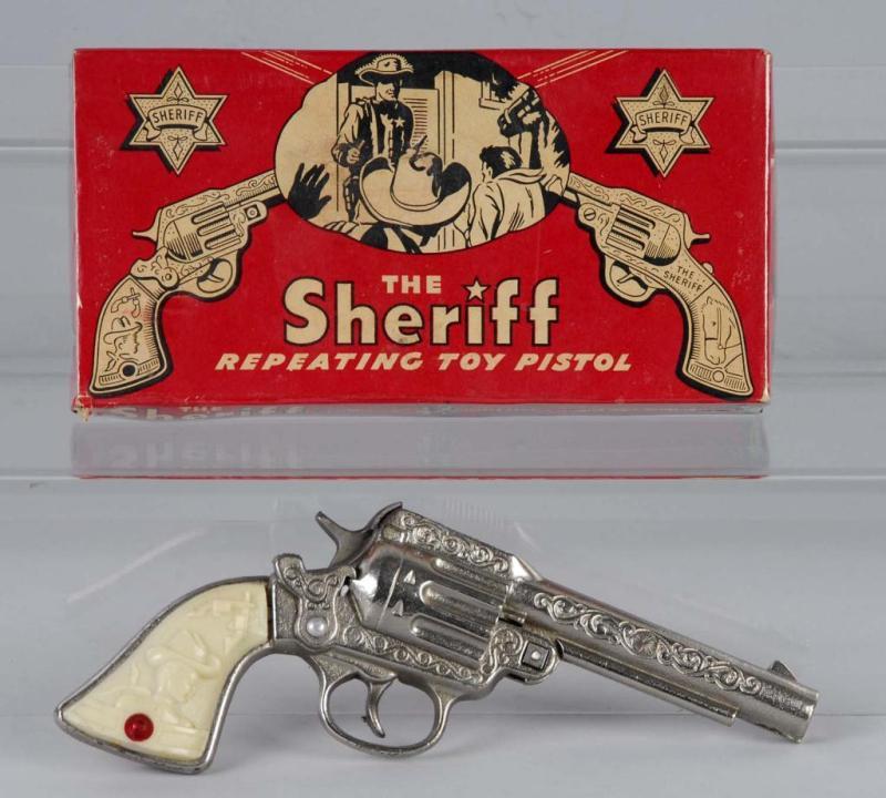 Appraisal: Cast Iron Stevens Sheriff Cap Gun Description Includes box Box