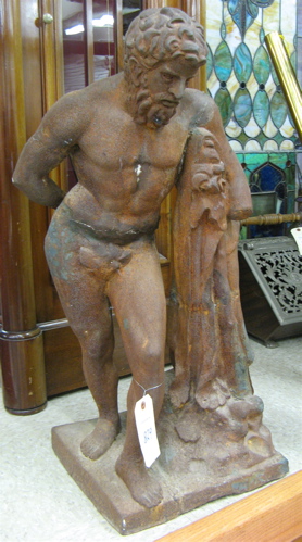 Appraisal: CAST IRON FIGURE OF DIONYSUS THE ELDER the nude male