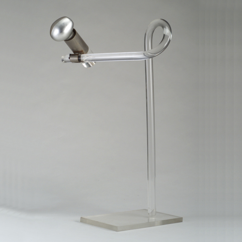 Appraisal: French lucite table lamp with single adjustable fixture and looped